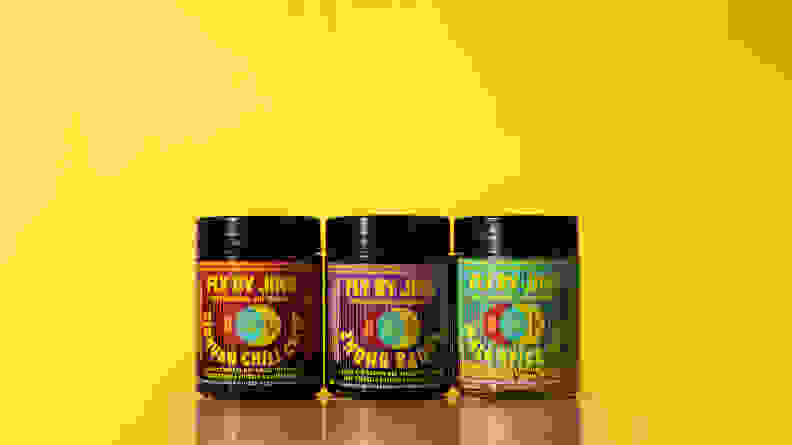 There are three jars of sauces and spice blends by Fly By Jing. From the left, there's the Sichuan Chili Crisp, Zhong Sauce, and Mala Spice Mix.