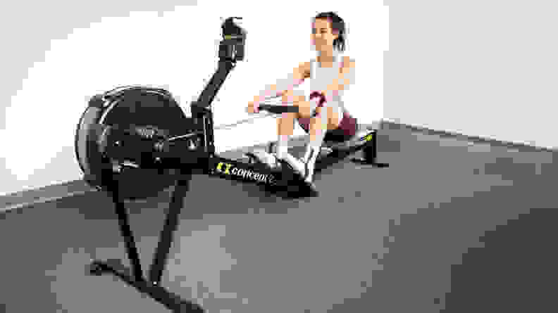 Women exercising on concept2 rowerg.