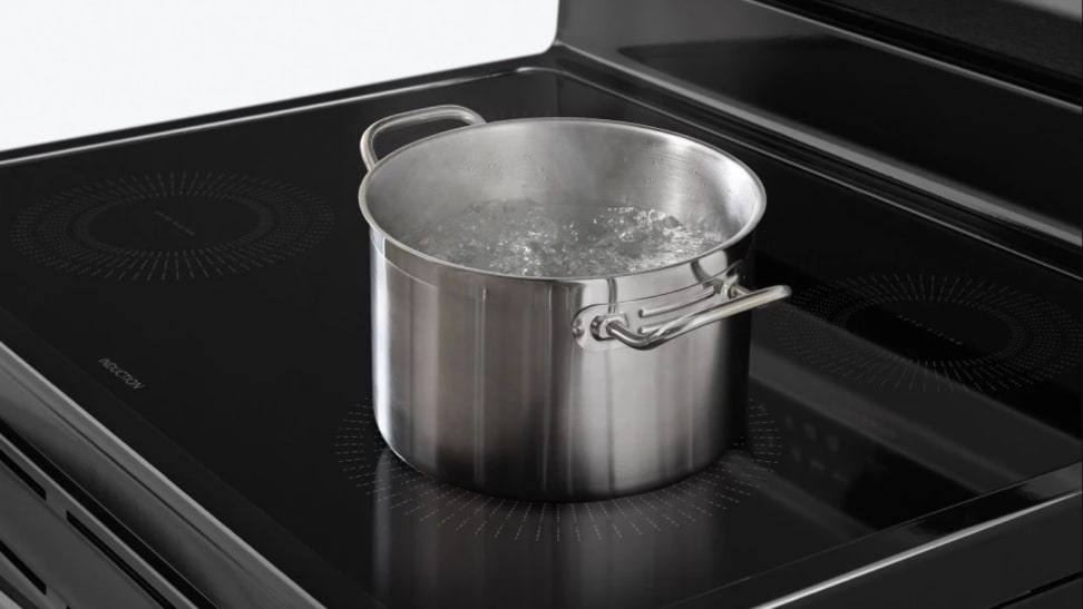 A pot of water boils quickly on a convection range