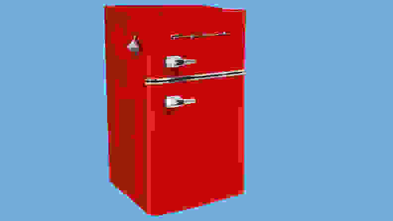 The Frigidaire EFR840 mini fridge on a blue background.