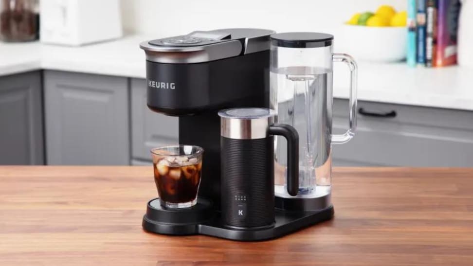 A Keurig machine sitting on a kitchen counter.