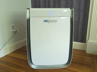 The Air Doctor Pro 3500i, one of the best air purifiers, is shown in a home.