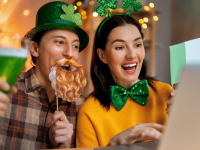 A couple wears St. Patrick's Day garb.