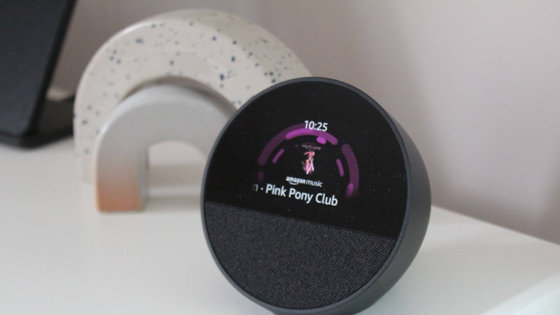 The Echo Spot with the Amazon Music screen displaying “Pink Pony Club.”