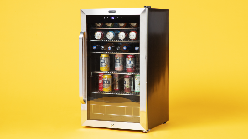 A product shot of the Whynter BR-1211DS mini fridge. It's fully stocked with cans of drinks.