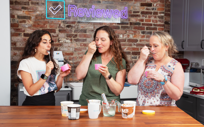 Three people enjoying dairy free ice cream with spoons.