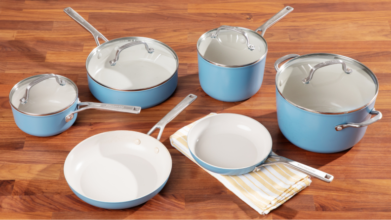 The KitchenAid 10-piece Hard Anodized Ceramic Nonstick Cookware Set sitting atop a table.