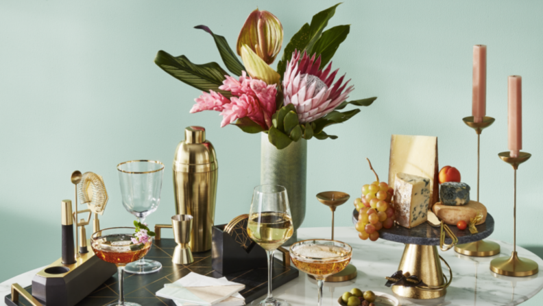 various bar and kitchen items on marble table