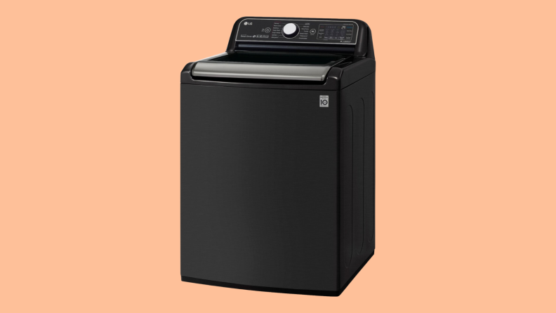 An LG WT7900HBA top-loading washing machine sits on a peach background.